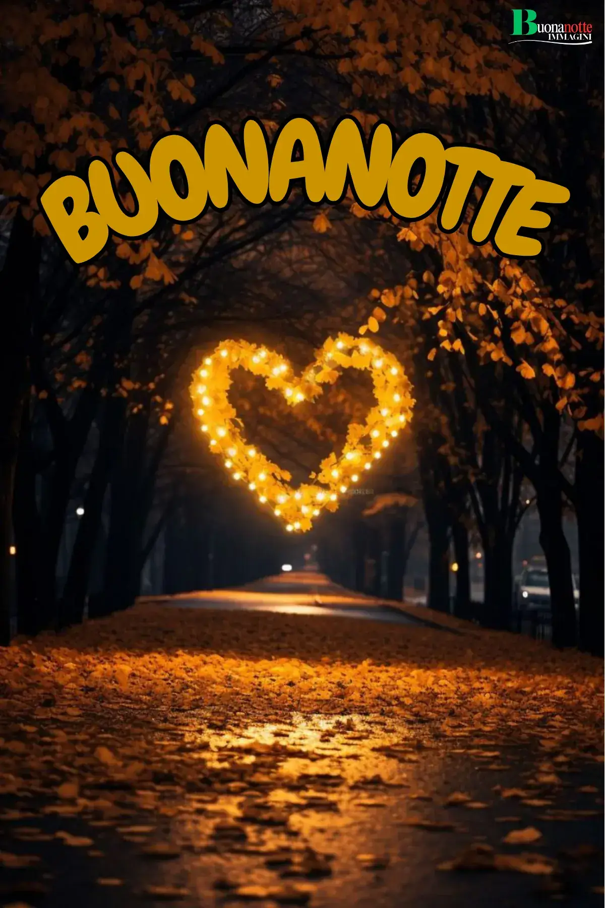 Viale autunnale notturno con cuore luminoso e foglie dorate immagine buonanotte