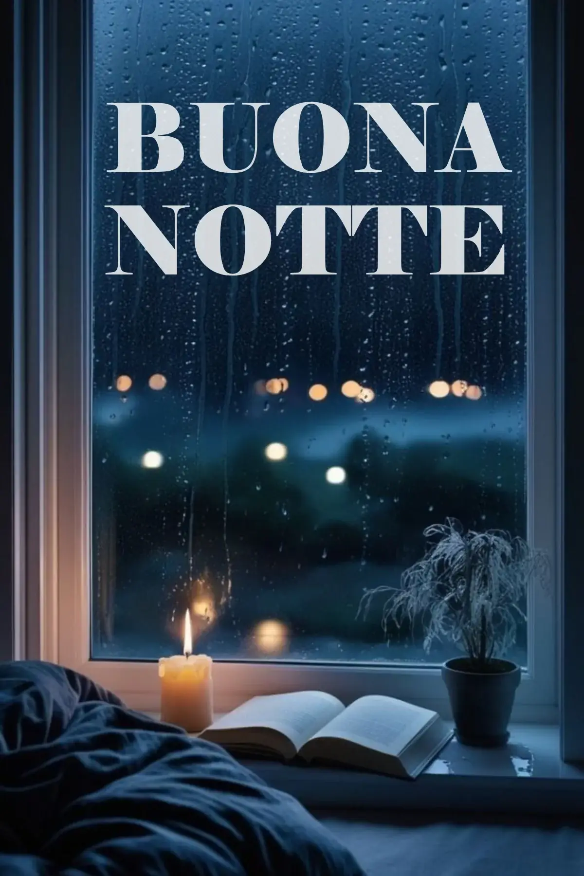 Finestra con pioggia candela libro aperto davanzale notte immagine buonanotte romantica