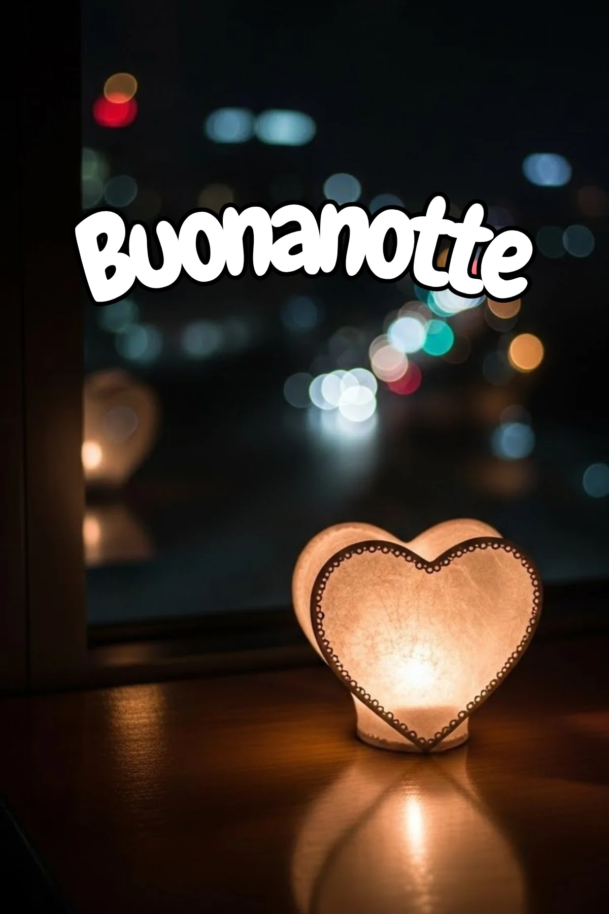 Lanterna a cuore illuminata sul davanzale con luci notturne buonanotte speciale