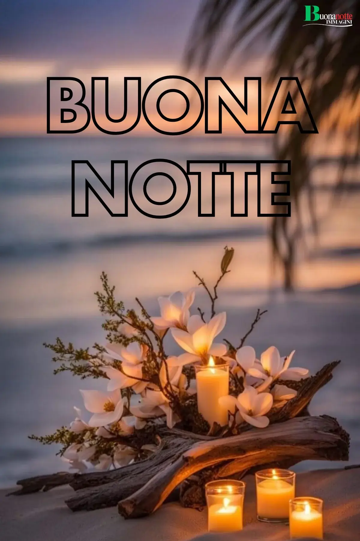 Candele sulla sabbia al mare buonanotte estiva