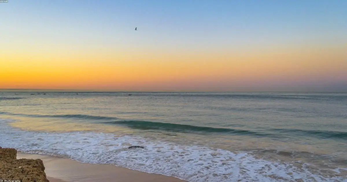 Mare calmo al tramonto buonanotte estiva serena