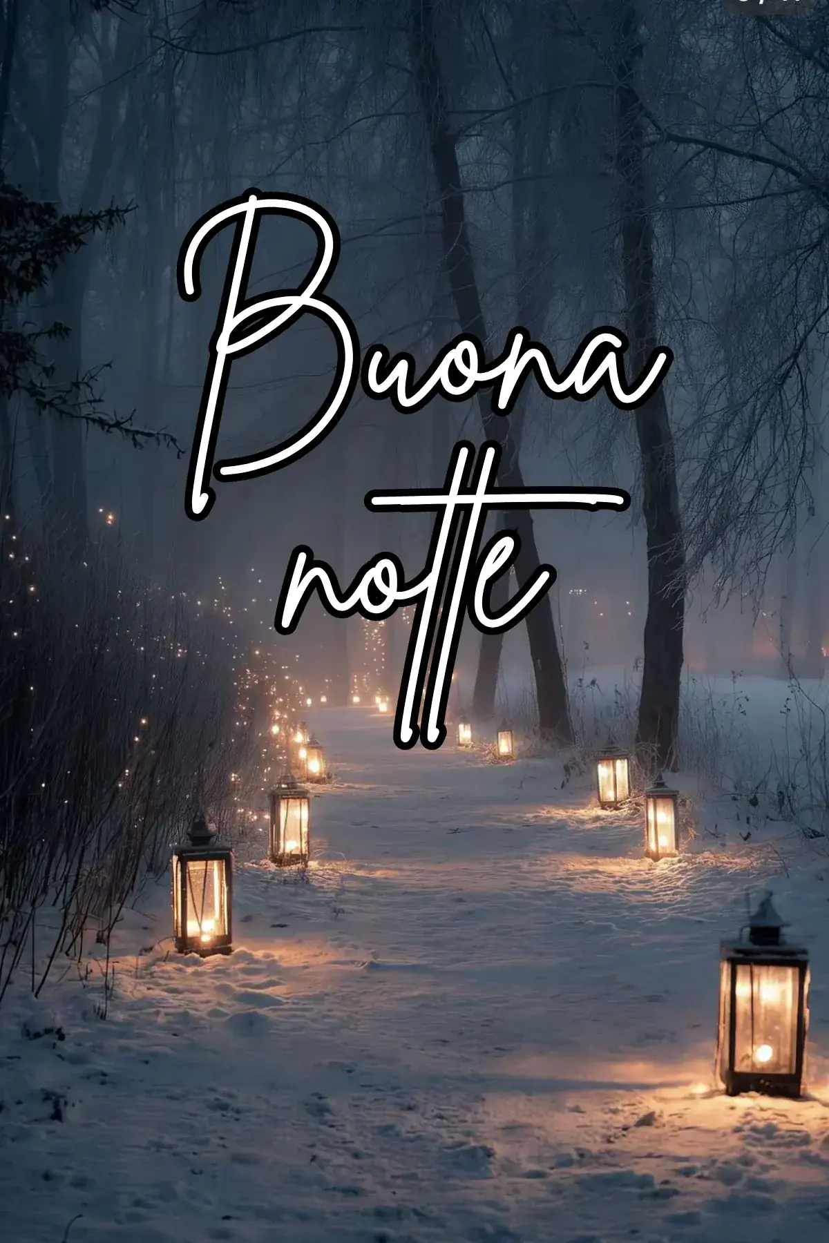 Sentiero innevato nel bosco con lanterne luminose buonanotte invernale
